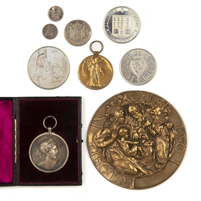 Lot 24 - Small group of medals and coins including a...