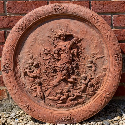 Lot 1246 - A terracotta plaque or roundel