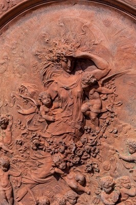 Lot 1246 - A terracotta plaque or roundel
