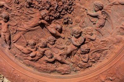 Lot 1246 - A terracotta plaque or roundel