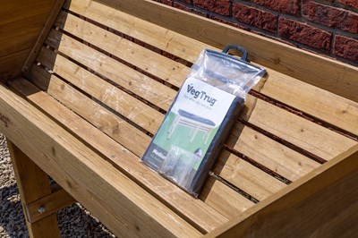 Lot 1231 - A modern wooden V-section planter