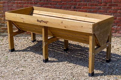 Lot 1231 - A modern wooden V-section planter