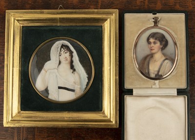 Lot 28 - Two miniature portraits to include an...