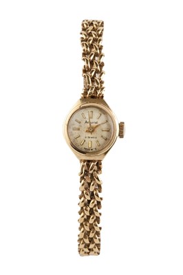 Lot 124 - A lady's 9ct gold bracelet watch by Accurist,...