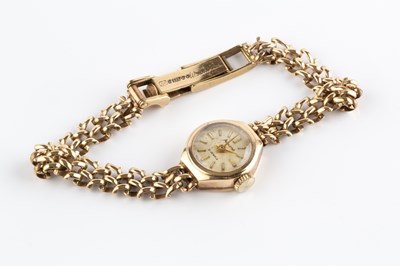 Lot 124 - A lady's 9ct gold bracelet watch by Accurist,...