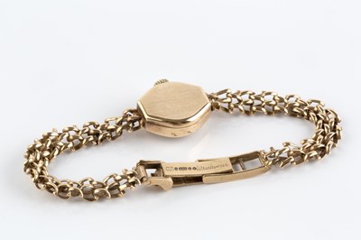 Lot 124 - A lady's 9ct gold bracelet watch by Accurist,...