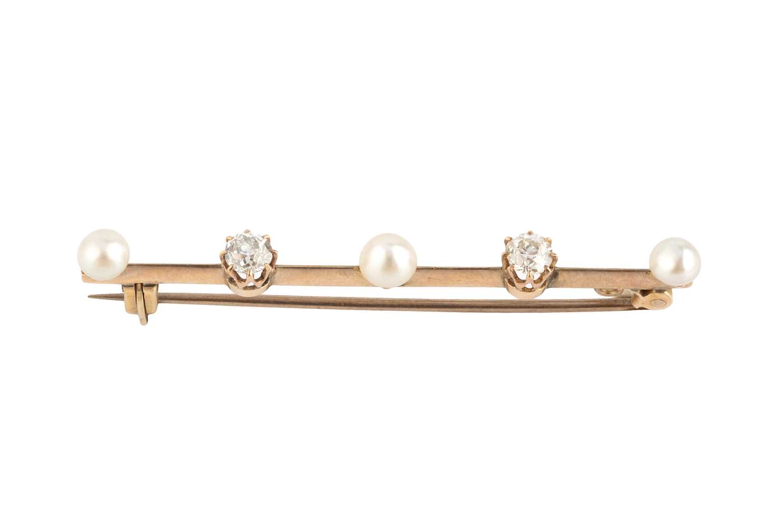 Lot 40 - A pearl and diamond bar brooch, the knife edge...