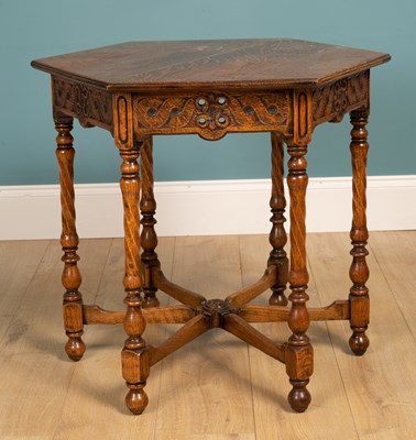 Lot 183 - An antique oak hexagonal centre table