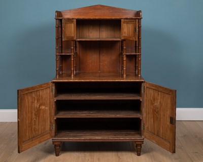 Lot 277 - A Bombay Furniture Company teak cabinet