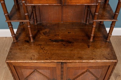 Lot 277 - A Bombay Furniture Company teak cabinet