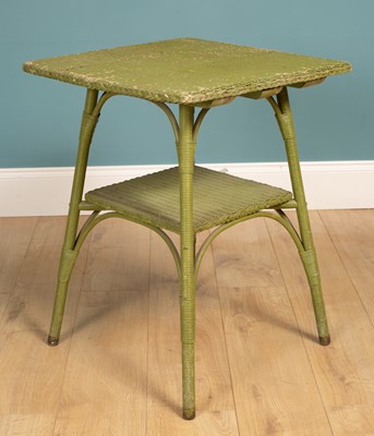 Lot 259 - A green painted Lloyd Loom style occasional table