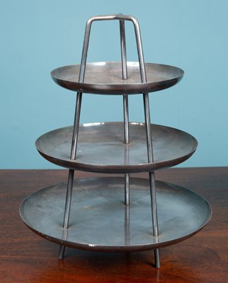 Lot 215 - A silver plated Christofle three-tier cake stand of simple form