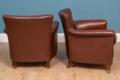 Lot 323 - A pair of leatherette upholstered library tub chairs