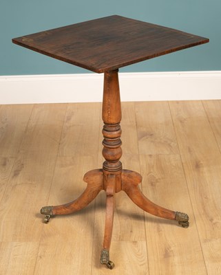 Lot 574 - A 19th century rosewood and simulated rosewood tilt-top occasional table