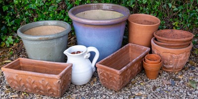 Lot 1199 - A group of flowerpots, planters and a jug