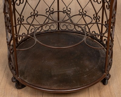 Lot 274 - A circular brown painted wrought iron drinks trolley