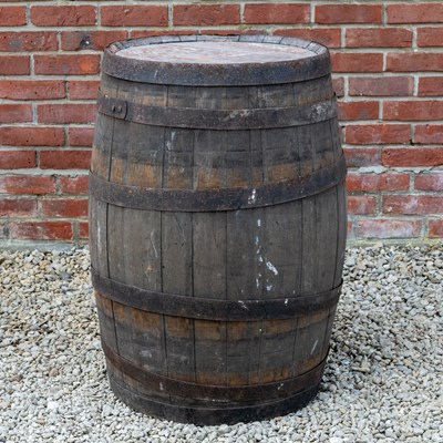 Lot 1249 - An old coopered oak barrel