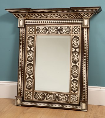 Lot 204 - A decorative inlaid Moghal designed hanging wall mirror