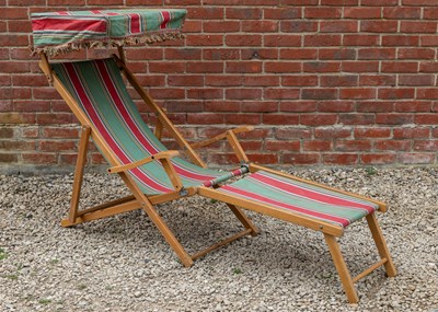 Lot 1213 - A Geebro red and green striped, folding deckchair