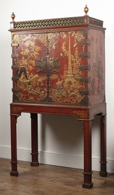 Lot 170 - Red lacquered cabinet on stand Chinese,...