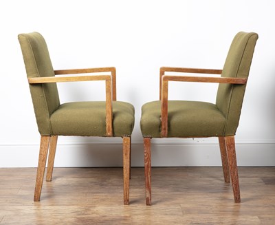 Lot 101 - Pair of Heals elbow chairs Limed oak frame,...