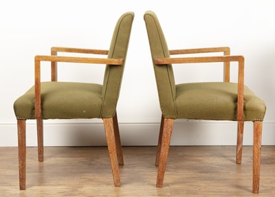 Lot 101 - Pair of Heals elbow chairs Limed oak frame,...