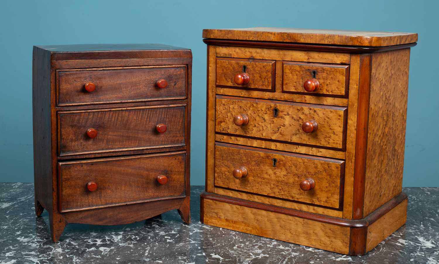 Lot 585 - A Victorian miniature chest of drawers and another similar