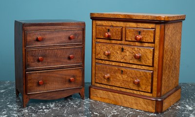 Lot 585 - A Victorian miniature chest of drawers and another similar