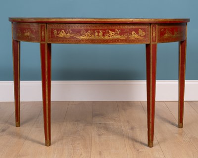 Lot 171 - Two similar red lacquered console tables