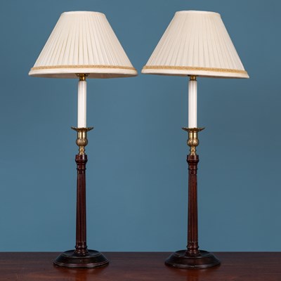 Lot 571 - A pair of Georgian style hardwood table lamps