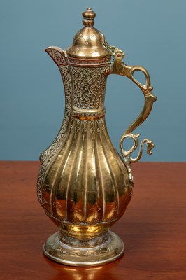 Lot 382 - A 19th century Bokhara brass jug