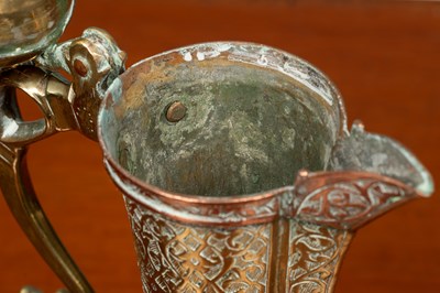 Lot 382 - A 19th century Bokhara brass jug