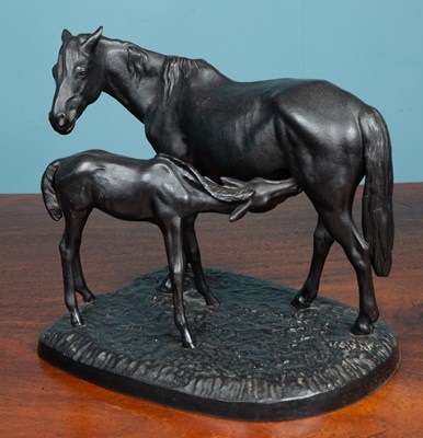 Lot 100 - Russian School, a cast iron sculpture depicting a mare and its foal