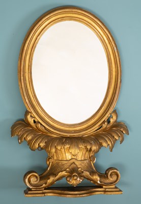 Lot 561 - An Italian gilt carved wood dressing table mirror