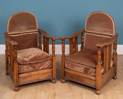 Lot 251 - A pair of Arts & Crafts beechwood reclining low armchairs