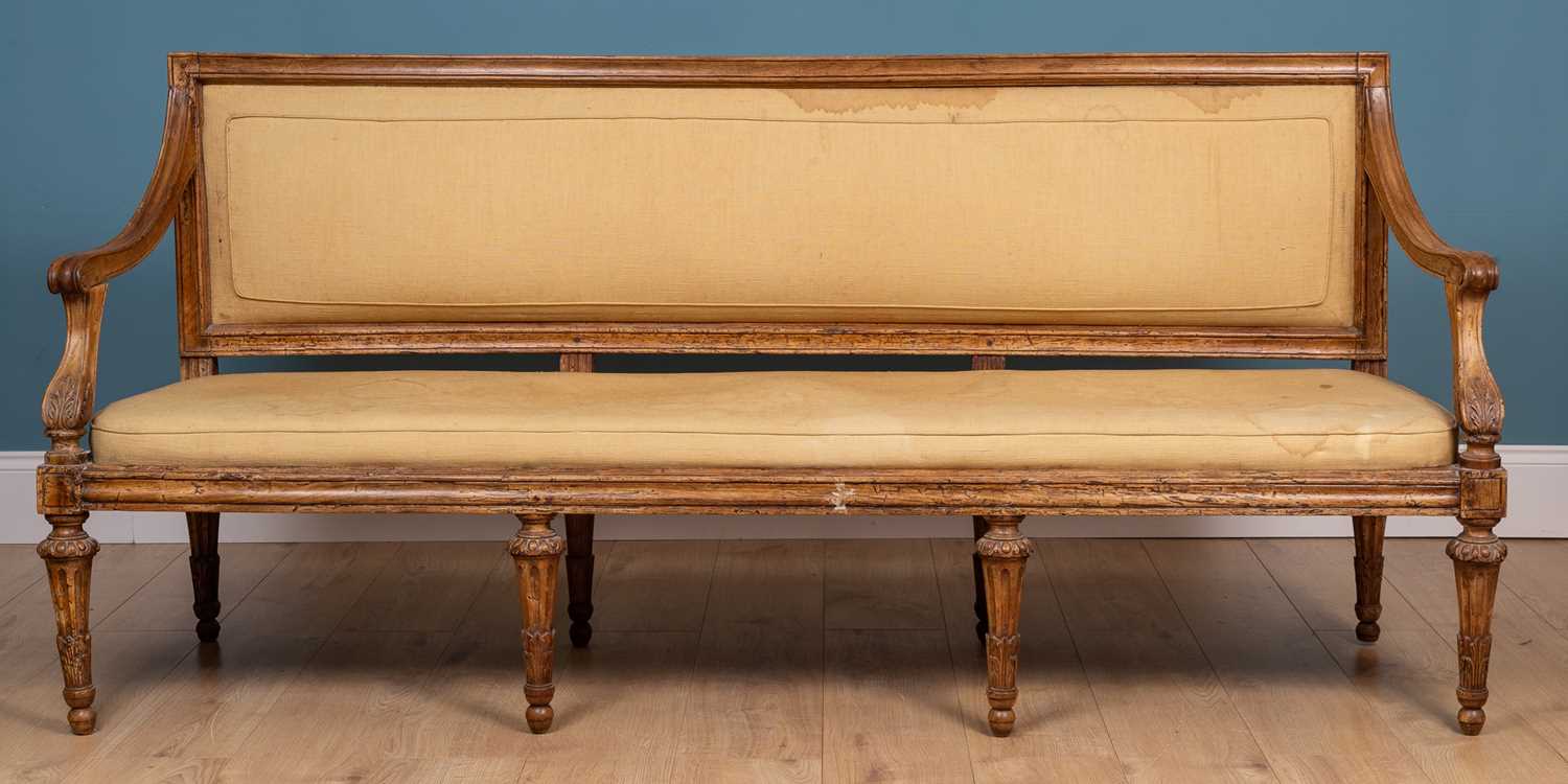 Lot 15 - A Continental, possibly Italian, chestnut sofa in the Neoclassical style