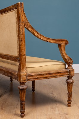Lot 15 - A Continental, possibly Italian, chestnut sofa in the Neoclassical style