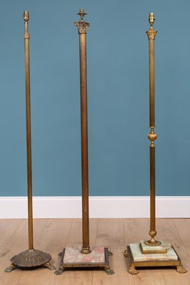 Lot 104 - An Italian brass standard lamp; and two further similar standard lamps