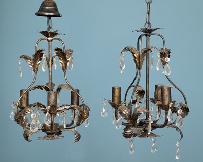 Lot 118 - A pair of French bronzed "Marie Thérèse" three-light chandeliers