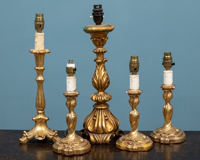 Lot 388 - Five gilt table lamps