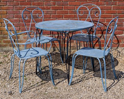 Lot 1255 - A blue painted wrought iron circular garden table with a set of four matching garden armchairs