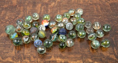 Lot 369 - Collection of green and coloured glass marbles...