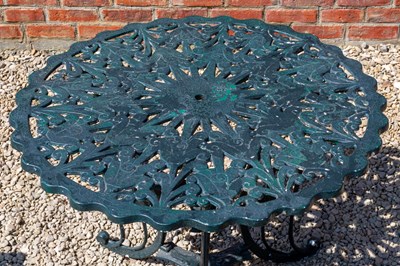 Lot 1227 - A circular, green painted, aluminium garden table with three cast aluminium green painted chairs