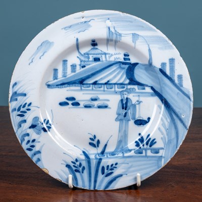 Lot 421 - An 18th century blue and white English delft plate