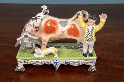 Lot 402 - An early 19th century Staffordshire bull baiting group