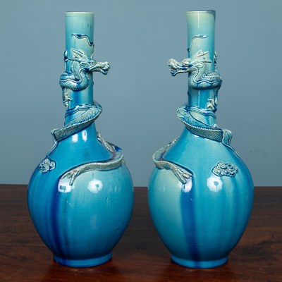 Lot 119 - A pair of Chinese turquoise glazed bottle vases
