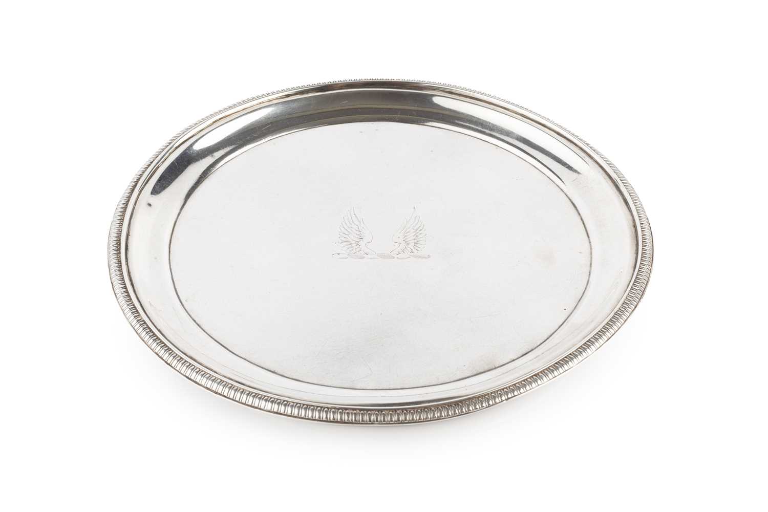 Lot 209 - A George III silver circular teapot stand,...