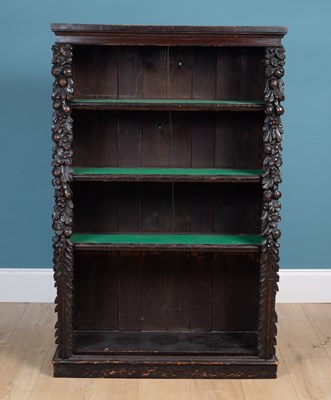 Lot 425 - A Victorian dark stained oak floor standing, open fronted bookcase