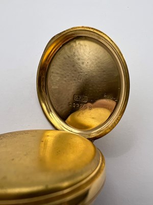 Lot 244 - An open face fob watch, the engine-turned gilt...