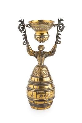 Lot 606 - A Continental silver-gilt wager cup, modelled...